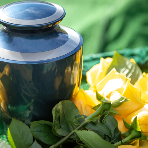 burial urn with yellow flowers