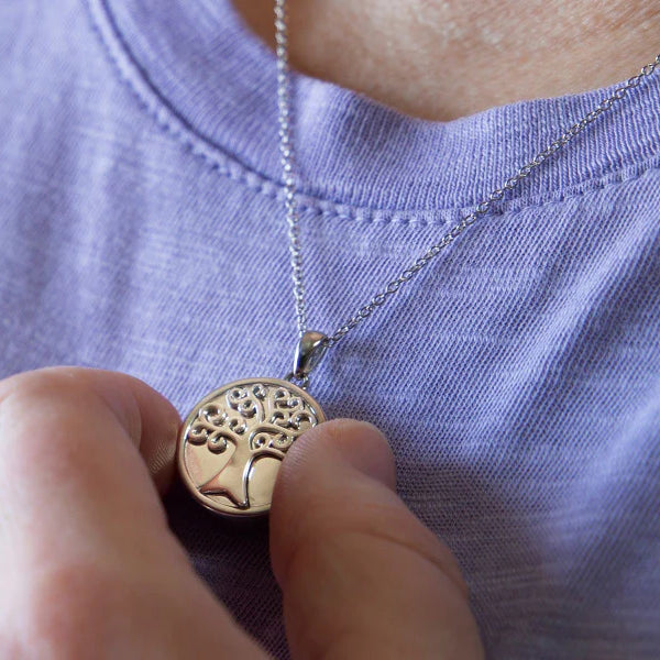 Woman Wearing Teardrop Pendant